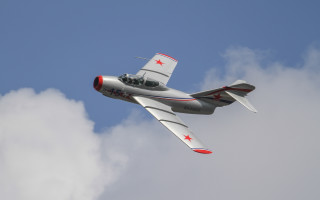 Small airplane cloudy sky red 2 - a red star free wallpaper