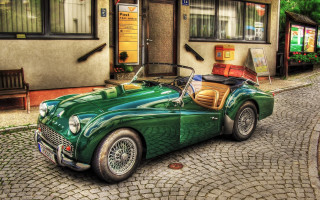 Green sports car cobblestone street - a cobblestone street in front free wallpaper