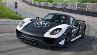 Black white sportscar driving road - adam szentpétery free wallpaper