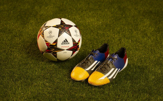 Soccer ball shoes grass field - official medium free wallpaper