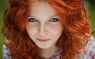 Red haired woman blue eyes 20 - a smile free wallpaper