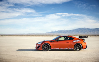 Desert mountains car cloudy sky 2 - a desert free wallpaper