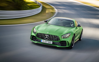 Green sports car race track 2 - a green sports car free wallpaper