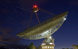 Satellite dish night stars urban - top of a building free wallpaper