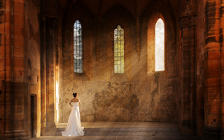 Woman white dress stone building - a stone building free wallpaper