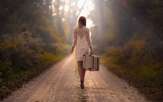 Woman walking dirt road suitcase 2 - cinematic photography free wallpaper