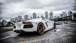 White sports car cityscape cloudy - andrew law free wallpaper