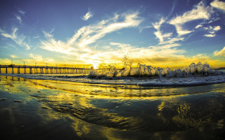 Pier waves sunset clouds bridge - a pier free wallpaper