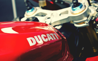 Red motorcycle ducati closeup blurry - a red motorcycle free wallpaper