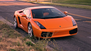 Orange sports car parked roadside - orange sports car free wallpaper