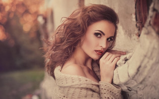 Woman leaning wall bokeh photorealistic - her cheek free wallpaper