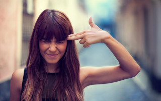 Woman smiling longhair handgesture street - a hand gesture free wallpaper