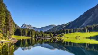 Lake mountains trees blue sky 41 - a clear blue sky above free wallpaper