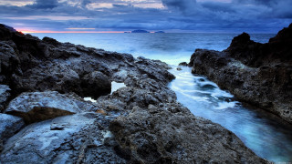 Rocky beach lake islands cloudy - a rocky beach free wallpaper