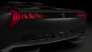 Black car red tail lights - a black car free wallpaper
