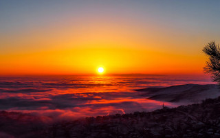 Sunset mountain tree cloud valley - a sunset over a mountain free wallpaper