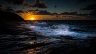 Sunset ocean waves rocks cityscape 2 - wave free wallpaper for desktop