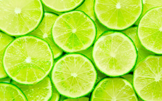 Limes halved stacked water droplets - half free wallpaper