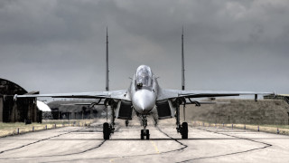Fighterjet runway cloudy sky backlit - a few cloud above free wallpaper