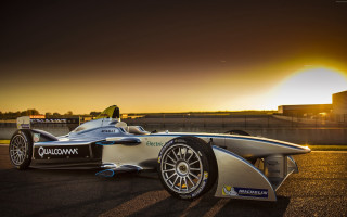 Silver racecar sunset building rimlight - the sun setting behind free wallpaper for desktop