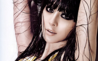 Woman blowing hair black eyes - black eye free wallpaper