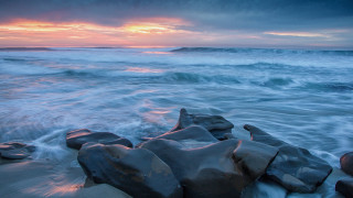Rocky beach sunset waves clouds 2 - a rocky beach free wallpaper