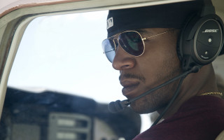 Afrofuturism pilot man sunglasses headset - afrofuturism free wallpaper