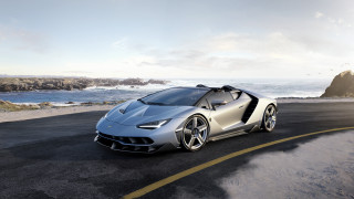 Silver sports car ocean cliff - a cliff in the background free wallpaper