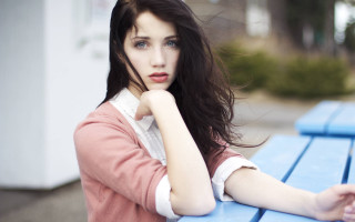 Woman bluebench crossedarms chin lookatcamera - pale skin free wallpaper