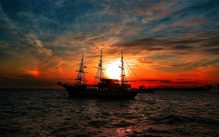 Sunset boat ocean city sky - sunset time free wallpaper