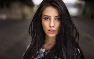 Woman longhair streetcorner serious portrait - a street corner free wallpaper