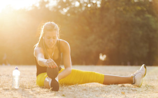 Woman yellow skirt exercising beach - claire dalby free wallpaper