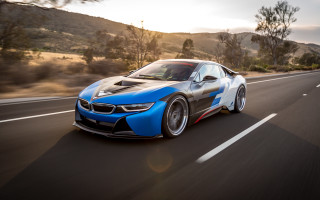 Blue sports car driving road 7 - the background and trees free wallpaper