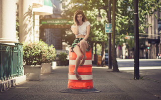 Woman trafficcone cityscape outdoor portrait - bush free wallpaper
