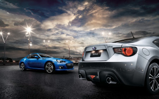 Blue sports car parking lot 12 - two car free wallpaper