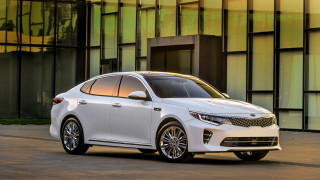 White car glass wall building - a door in the background free wallpaper