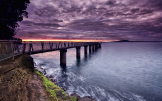 Pier sunset ocean purple sky - a dark cloud free wallpaper