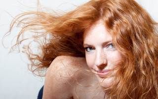 Red haired woman blowing wind 2 - claire falkenstein free wallpaper