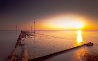 Long pier sunset water poles - a long pier free wallpaper