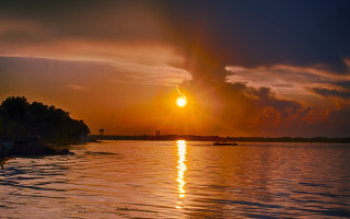 Sunset river cityscape clouds mountain - a sunset over a body of water free wallpaper