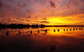 Sunset clouds reflection poles matte - a few pole free wallpaper
