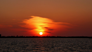 Sunset water boat tower mountain - free sunset wallpaper