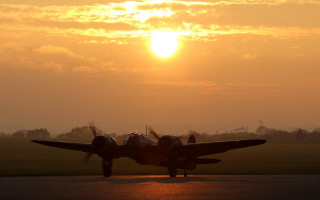 Plane takeoff sunset clouds backlit - a runway free wallpaper