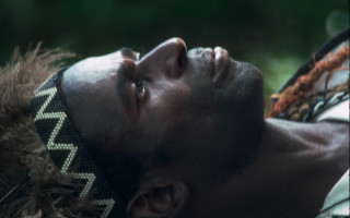 Afrofuturism man headband lying closed - bernard accama free wallpaper