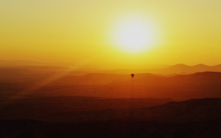 Hot air balloon sunset mountains 2 - a hot air balloon free wallpaper