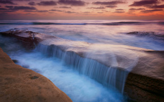 Waterfall ocean sunset clouds red - a red sky free wallpaper
