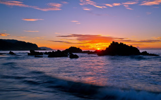 Sunset ocean rocks waves bridge - a sunset over the ocean free wallpaper for desktop