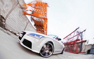 White sports car street rollercoaster - motion blur free wallpaper