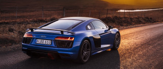Blue sports car road fence - a blue sports car free wallpaper