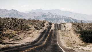 Mountain road clouds trees lake - carl hoppe free wallpaper